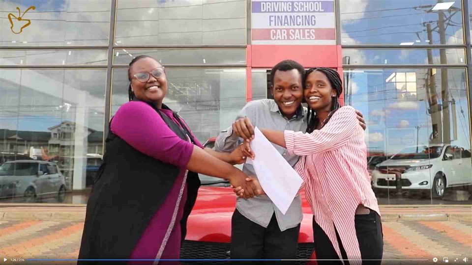 A Maridady SACCO member receiving her car